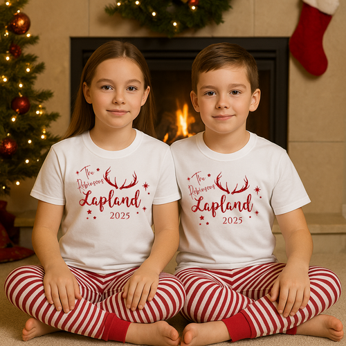 Two children wearing matching pajamas with Personalised name and Lapland 2025 text in a festive setting.
Lapland holiday matching pyjamas sets for personalised Lapland travel PJs
