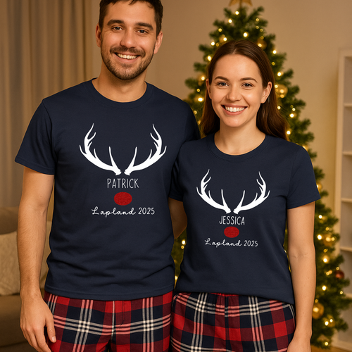 Two people wearing matching navy blue t-shirts with antler designs and text, standing in front of a decorated Christmas tree.
Matching family Lapland pyjamas – personalised Lapland holiday PJs perfect as cosy Christmas Lapland pajamas, Lapland trip reveal matching outfits, or a family Lapland pyjama gift idea. These personalised Lapland travel PJs are ideal for festive photos and Lapland holiday matching pyjamas sets.