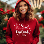 Woman wearing a red personalised Search for Santa 2026 Lapland hoodie