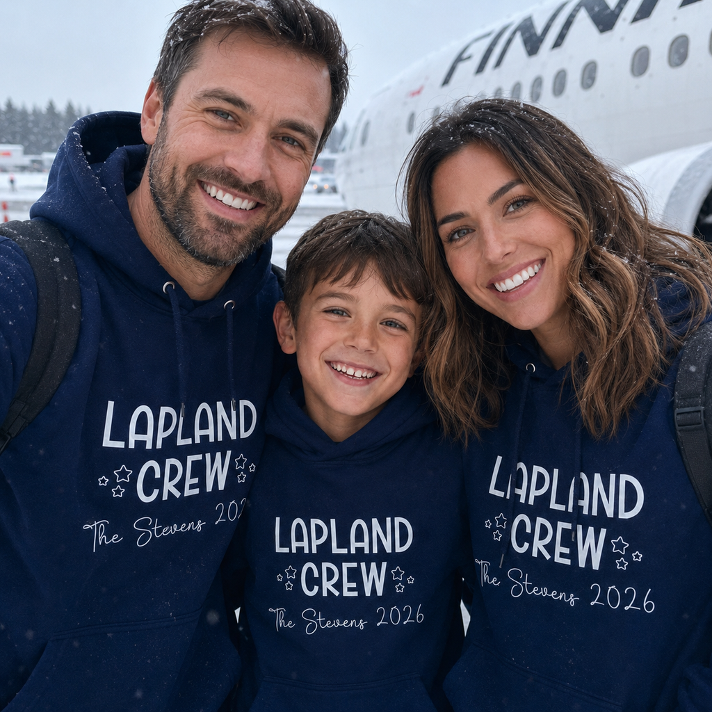 Close-up of matching navy personalised Lapland Crew hoodies
