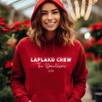 Woman wearing a red personalised Lapland Crew hoodie with family surname and 2026
Family in matching red hoodies	matching-family-lapland-crew-hoodies-red.jpg	Family wearing matching red personalised Lapland Crew hoodies in the snow
Child in red hoodie	childrens-personalised-lapland-crew-hoodie.jpg	Child wearing a red personalised Lapland Crew hoodie with surname and year
Black hoodie product image	black-personalised-lapland-crew-hoodie.jpg	Black personalised Lapland Crew hoodie featuring a family surname an